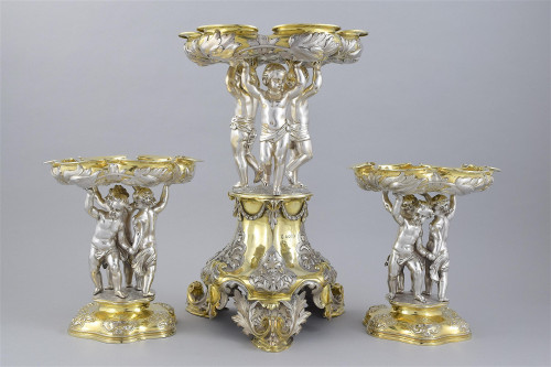 A parcel gilt, Victorian Silver Garniture.