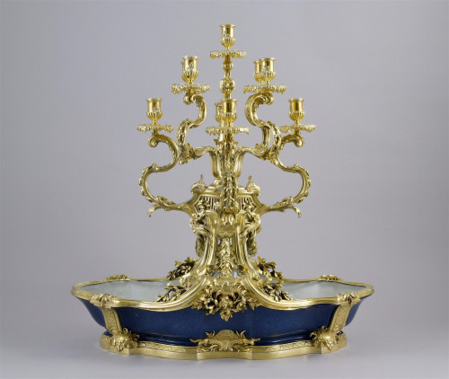 A magnificent French silver-gilt and blue-porcelain candelabrum centrepiece