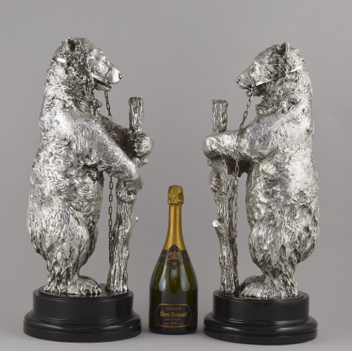 a magnificent pair of Victorian silver "bear and ragged staff" sculptures