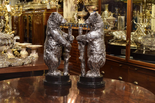 a magnificent pair of Victorian silver "bear and ragged staff" sculptures