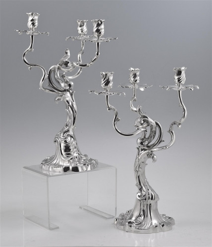 An unusual pair of antique asymmetrical design silver candelabra. Circa 1890