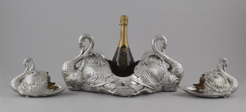 A Suite of three silver swan centrepieces.