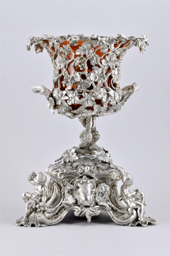 A magnificent victorian sterling silver and red glass vase / wine cooler