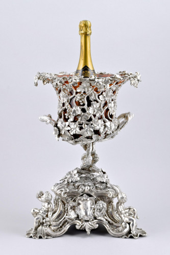 A magnificent victorian sterling silver and red glass vase / wine cooler