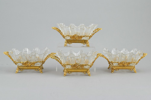 A Set of four silver-gilt and cut glass bonbon dishes