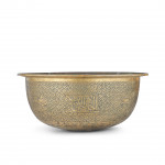 A LARGE MAMLUK ENGRAVED BRASS BASIN, EGYPT OR SYRIA, LATE 15TH–EARLY 16TH CENTURY