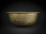 A LARGE MAMLUK ENGRAVED BRASS BASIN, EGYPT OR SYRIA, LATE 15TH–EARLY 16TH CENTURY