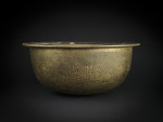 A LARGE MAMLUK ENGRAVED BRASS BASIN, EGYPT OR SYRIA, LATE 15TH–EARLY 16TH CENTURY