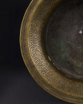 A MAMLUK ENGRAVED BRASS BASIN, EGYPT OR SYRIA, EARLY 16TH CENTURY