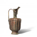 A KHORASAN SILVER AND COPPER INLAID BRONZE EWER, PERSIA, 12TH CENTURY