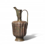 A KHORASAN SILVER AND COPPER INLAID BRONZE EWER, PERSIA, 12TH CENTURY