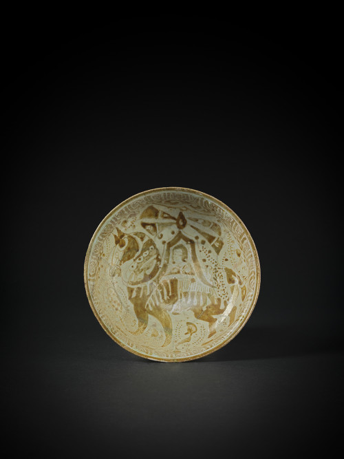 A KASHAN LUSTRE BOWL DEPICTING A HORSE AND RIDER, PERSIA, 12TH/ 13TH CENTURY