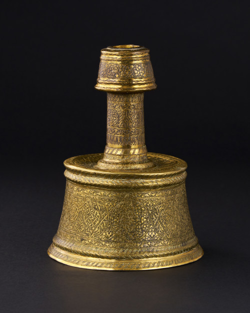 A RARE MAMLUK "VENETO-SARACENIC" CANDLESTICK, SYRIA, LATE 15TH CENTURY