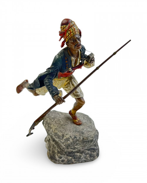 AN ORIENTALIST COLD-PAINTED VIENNA BRONZE FIGURE OF A RUNNING MOORISH WARRIOR, FRANZ XAVER BERGMAN, 20TH CENTURY