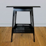 One ebonised walnut  occasional table in the design of James Shoolbred & Co circa 1905