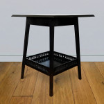 One ebonised walnut  occasional table in the design of James Shoolbred & Co circa 1905