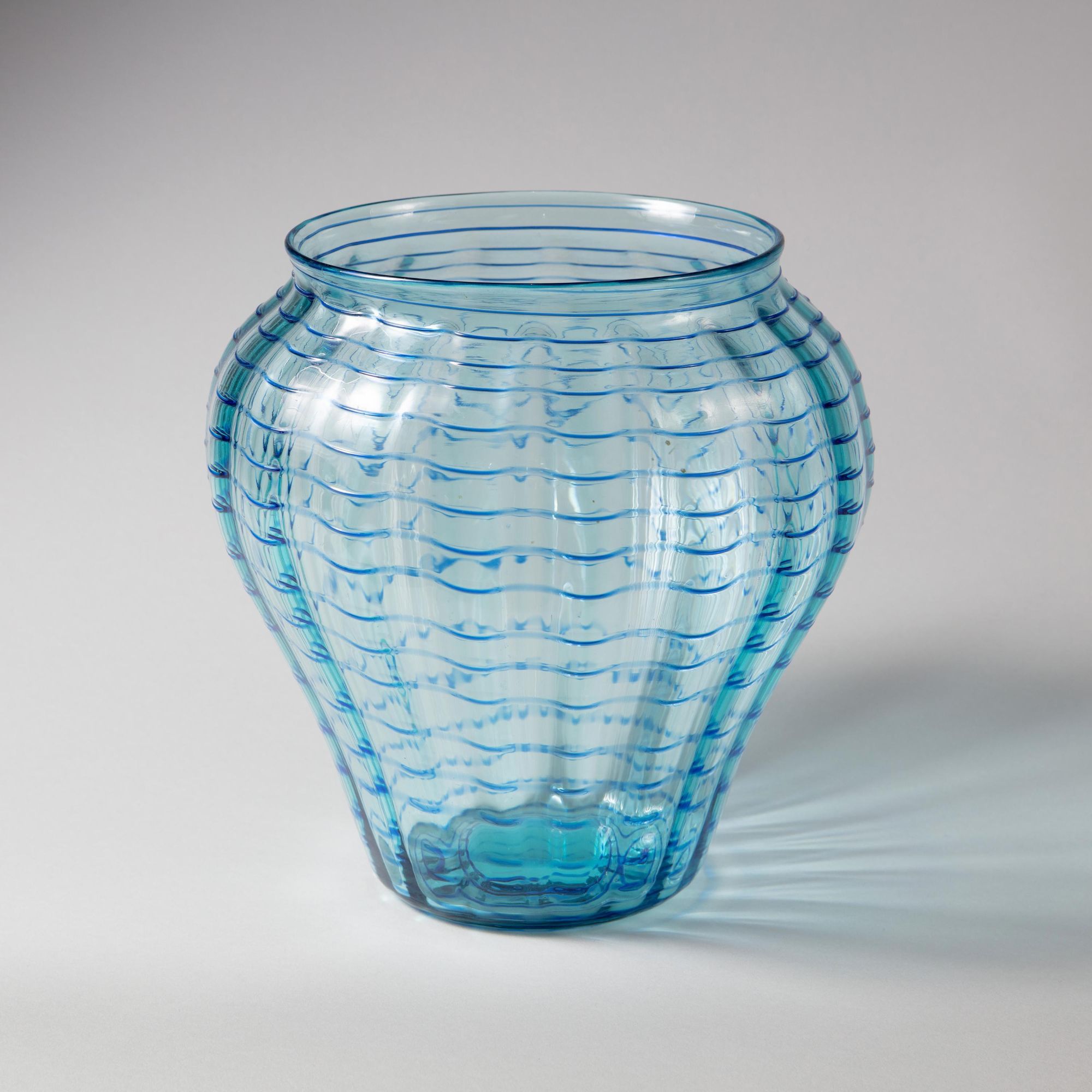 A James Powell & Sons threaded glass vase
