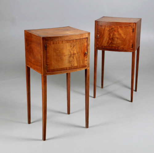 A pair of George III pot cupboards