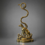 A collection of late 19th century brass door stops