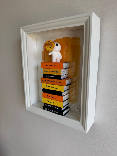 Mini Books - Orange stand with flowers.