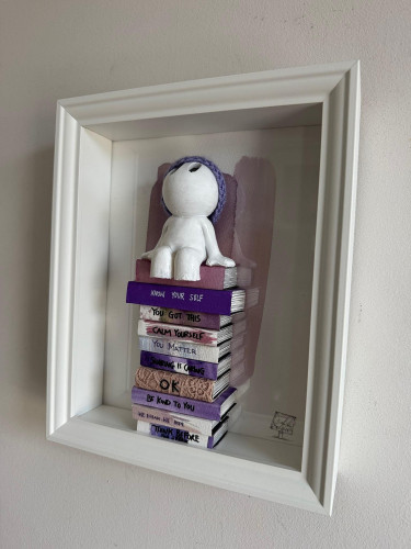 Purple hat mini books sit