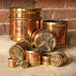 A Rare set of 9 Copper and Brass Seer Measures