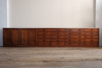Monumental mid 19th century bank of  mahogany factory drawers