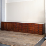 Monumental mid 19th century bank of  mahogany factory drawers