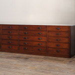 Monumental mid 19th century bank of  mahogany factory drawers