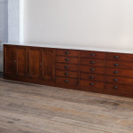 Monumental mid 19th century bank of  mahogany factory drawers
