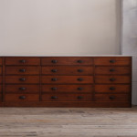 Monumental mid 19th century bank of  mahogany factory drawers