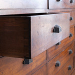 Monumental mid 19th century bank of  mahogany factory drawers