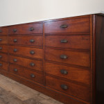 Monumental mid 19th century bank of  mahogany factory drawers