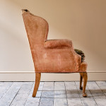Antique early 20th century wingback armchair