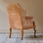 Antique early 20th century wingback armchair