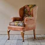 Antique early 20th century wingback armchair