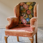 Antique early 20th century wingback armchair