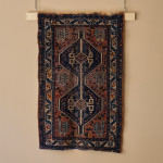 A small mid 20th century Persian Rug
