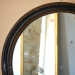 Early 19th Century Ebonized & Gilt Mirror.