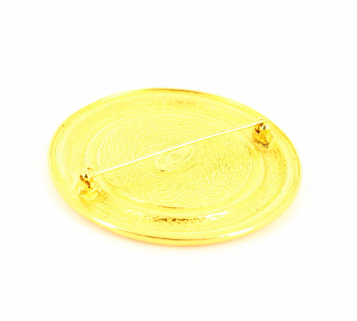 Gold Chanel brooch