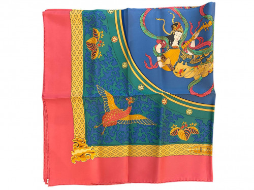 Hermès silk scarf in blue and pink with patterns
