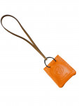 Mini Orange Hermes charm in orange and brown leather