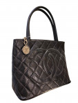 1997 Chanel handbag in black quilted grained leather with double C logo
