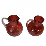 Pair of Victorian cranberry glass jugs