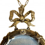 Belle Epoque 18ct gold diamond set locket