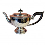 Four piece silver tea set