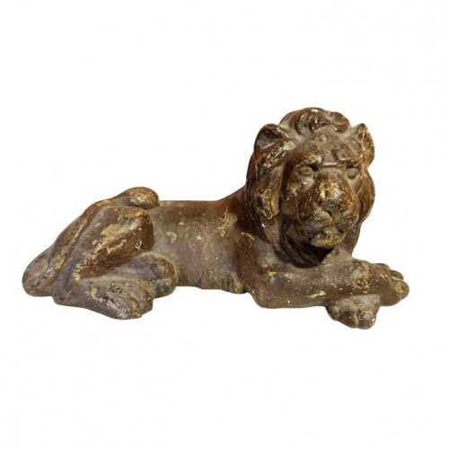 Cast figure of a recumbent lion