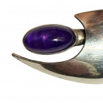 N E From Danish silver comet brooch