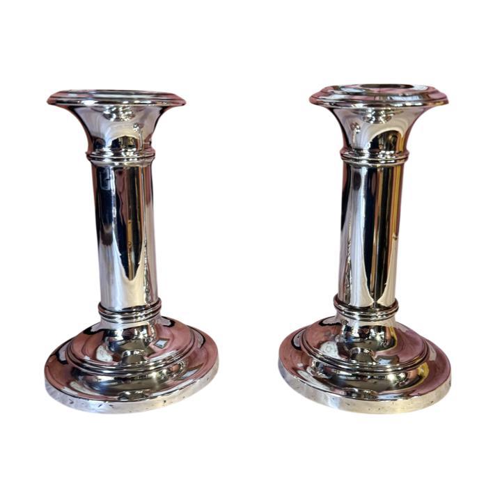 Pair of silver dwarf candle sticks