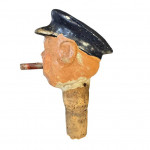 1940s Winston Churchill bottle stopper